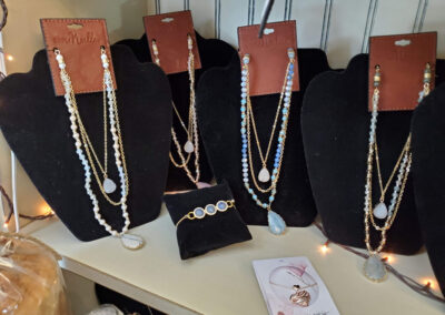 necklaces on display with stones