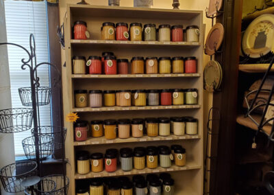 jarred candles in a variety of colors and scents