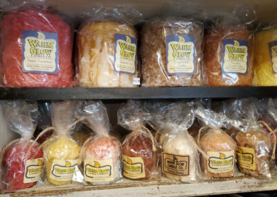 Warm Glow Candles in apple cinnamon and caramel corn scents