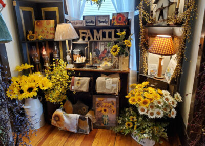 home decor at Old Homestead, sunflowers, plaid lamp shade, family sign, milk bottle and more