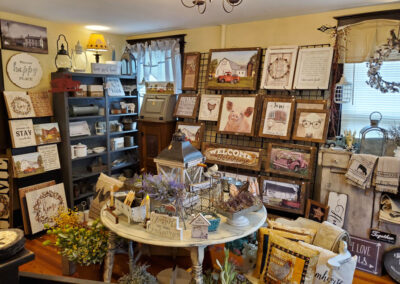 room at Olde Homestead with a variety of farmhouse wall art